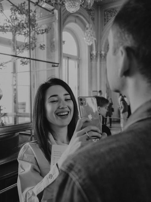 Smiling Woman Taking a Picture