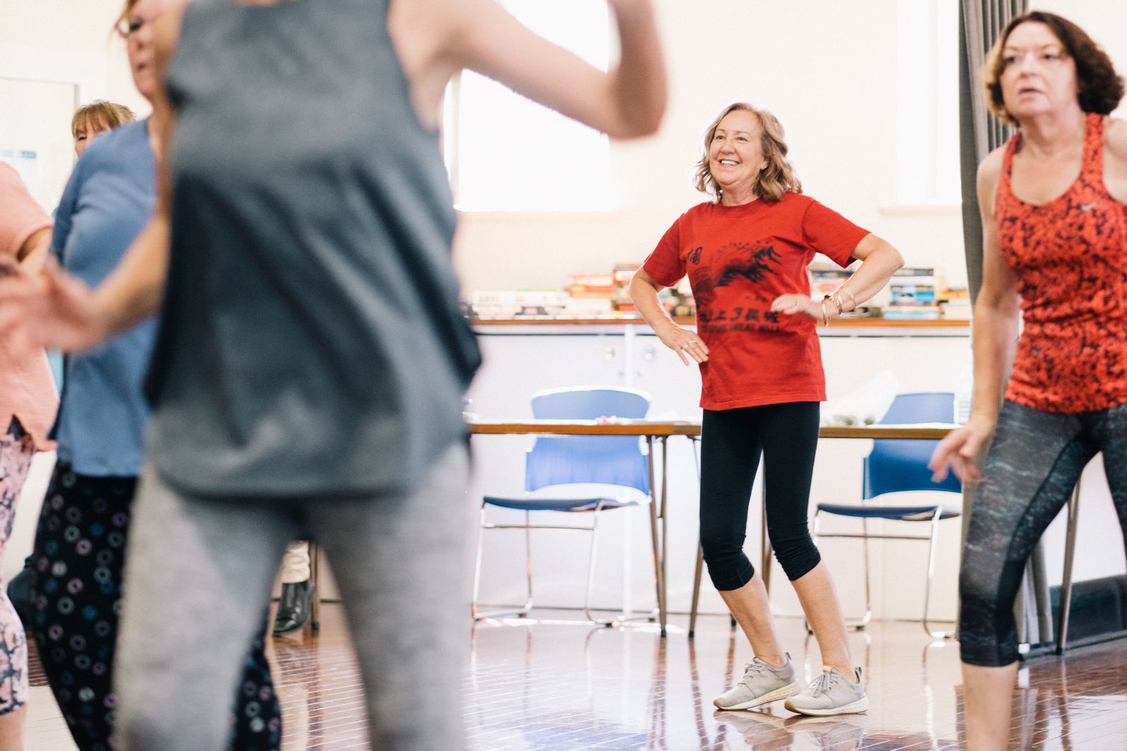 Energetic Zumba dance class in motion, reflecting the brand's Spanish-derived name