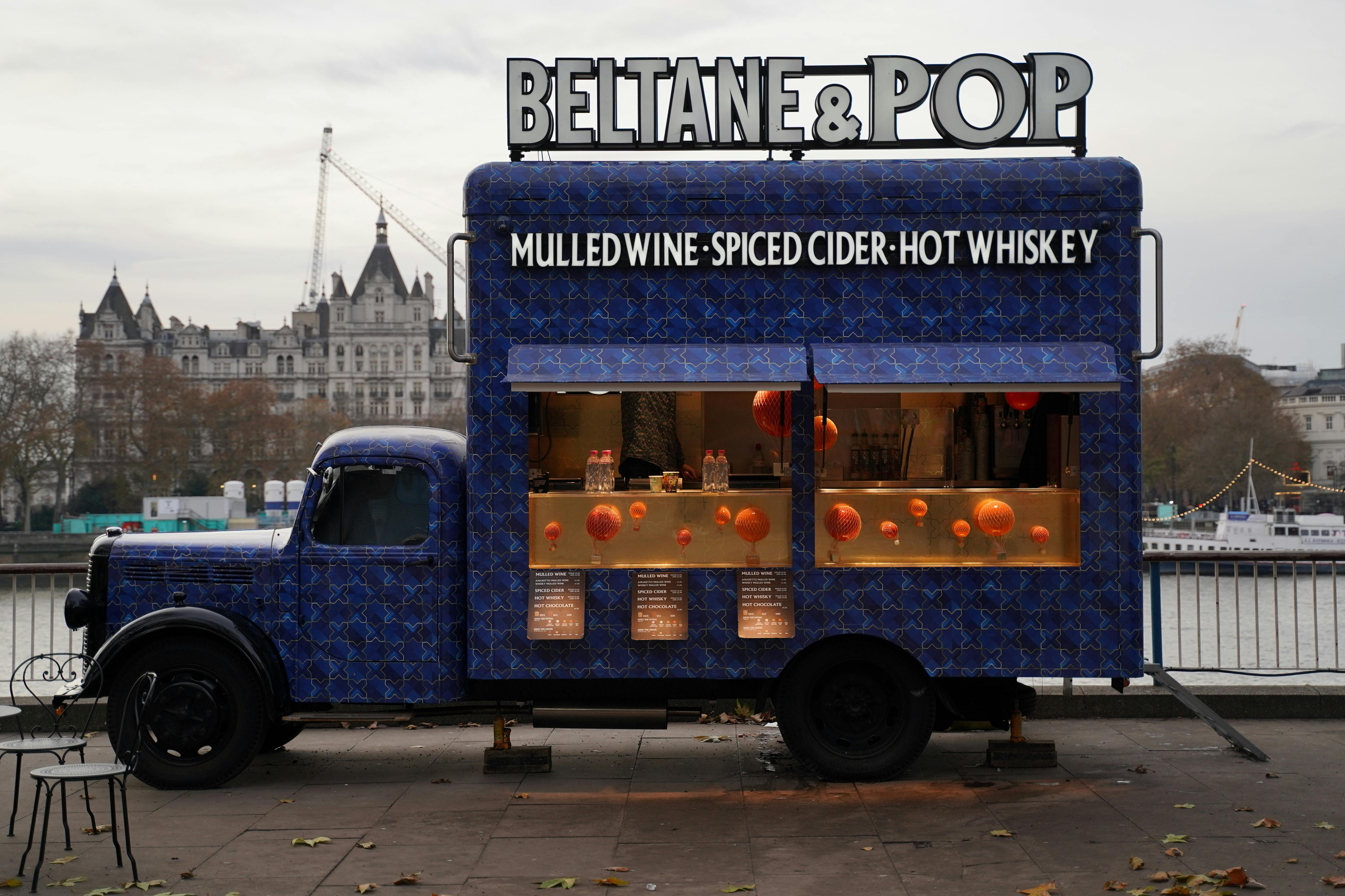 Food trucks lined up at a festival in Manchester