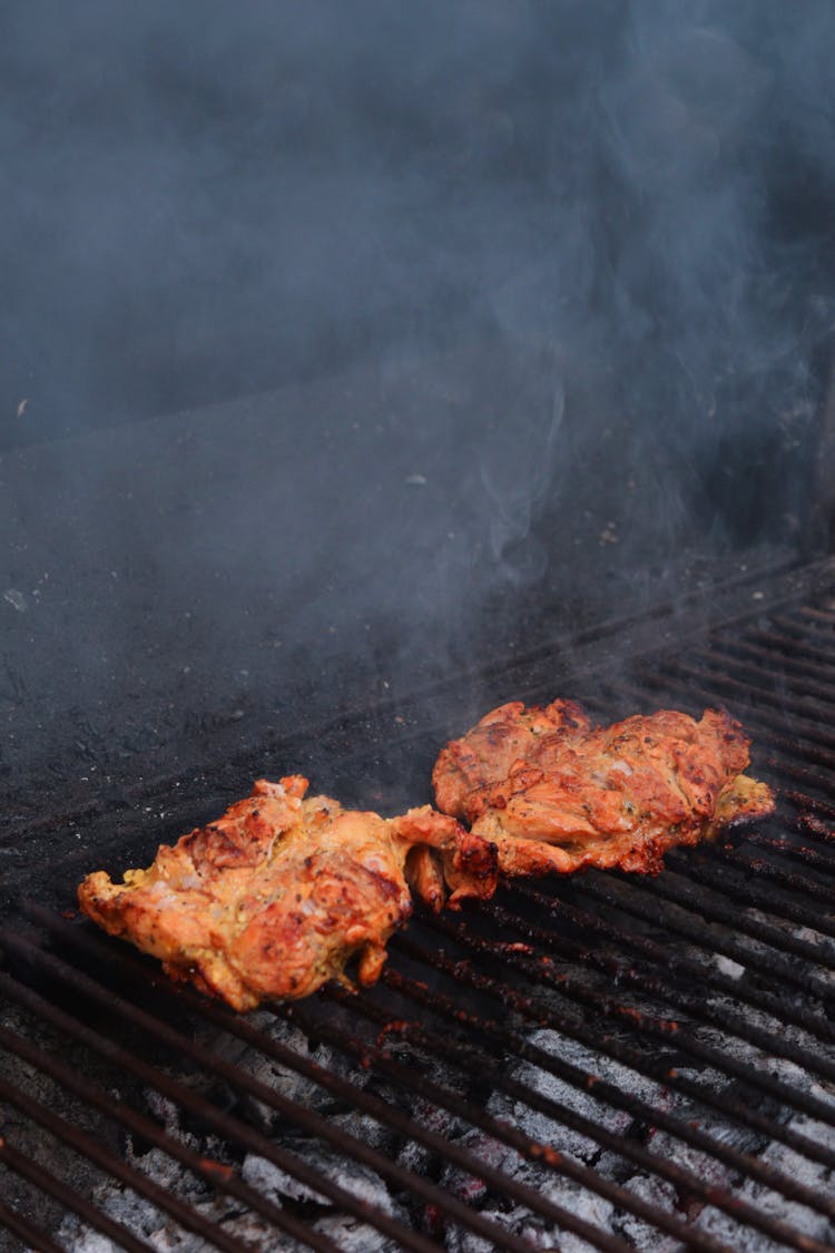 Close Up Of Meat On A Grill