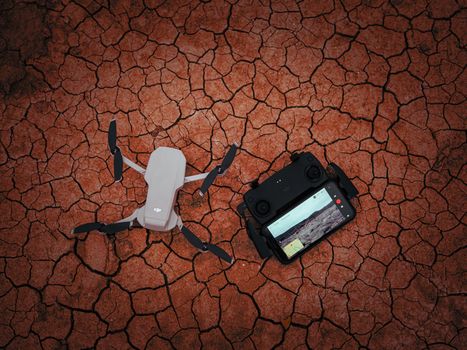 Drone with Controller on Scorched Ground