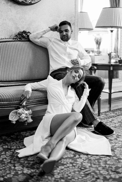 Free Stylish couple in a monochrome setting, showcasing a blend of fashion and intimacy indoors. Stock Photo