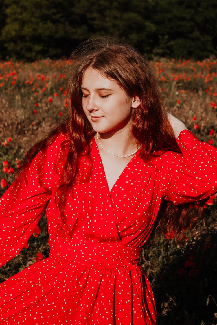 Woman Wearing A Red Polka Dot Dress