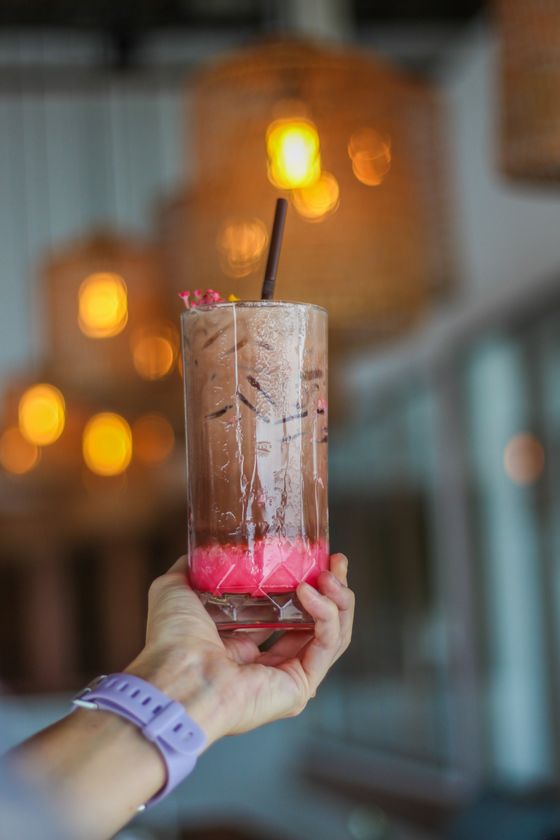 Chocolate milkshake with a straw