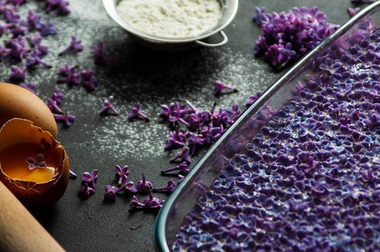 Petals Of Purple Flowers, Eggs And Flour