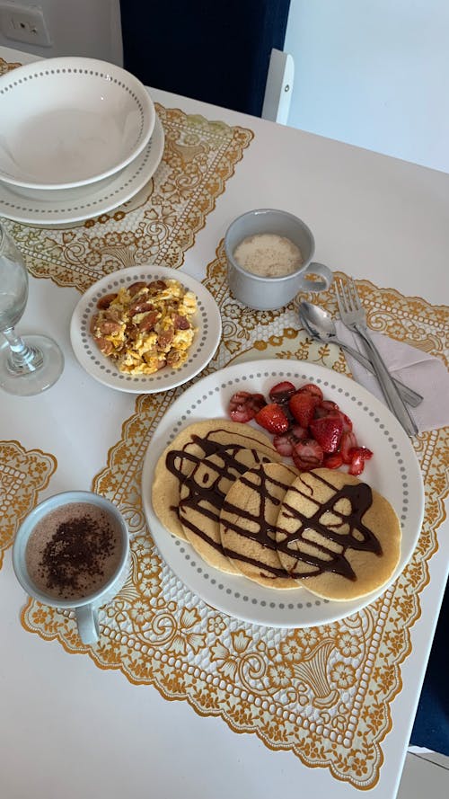 Pancakes With Strawberries on White Plate