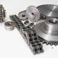 Machined sprockets and roller chain, photo by Mario Ame on Pexels