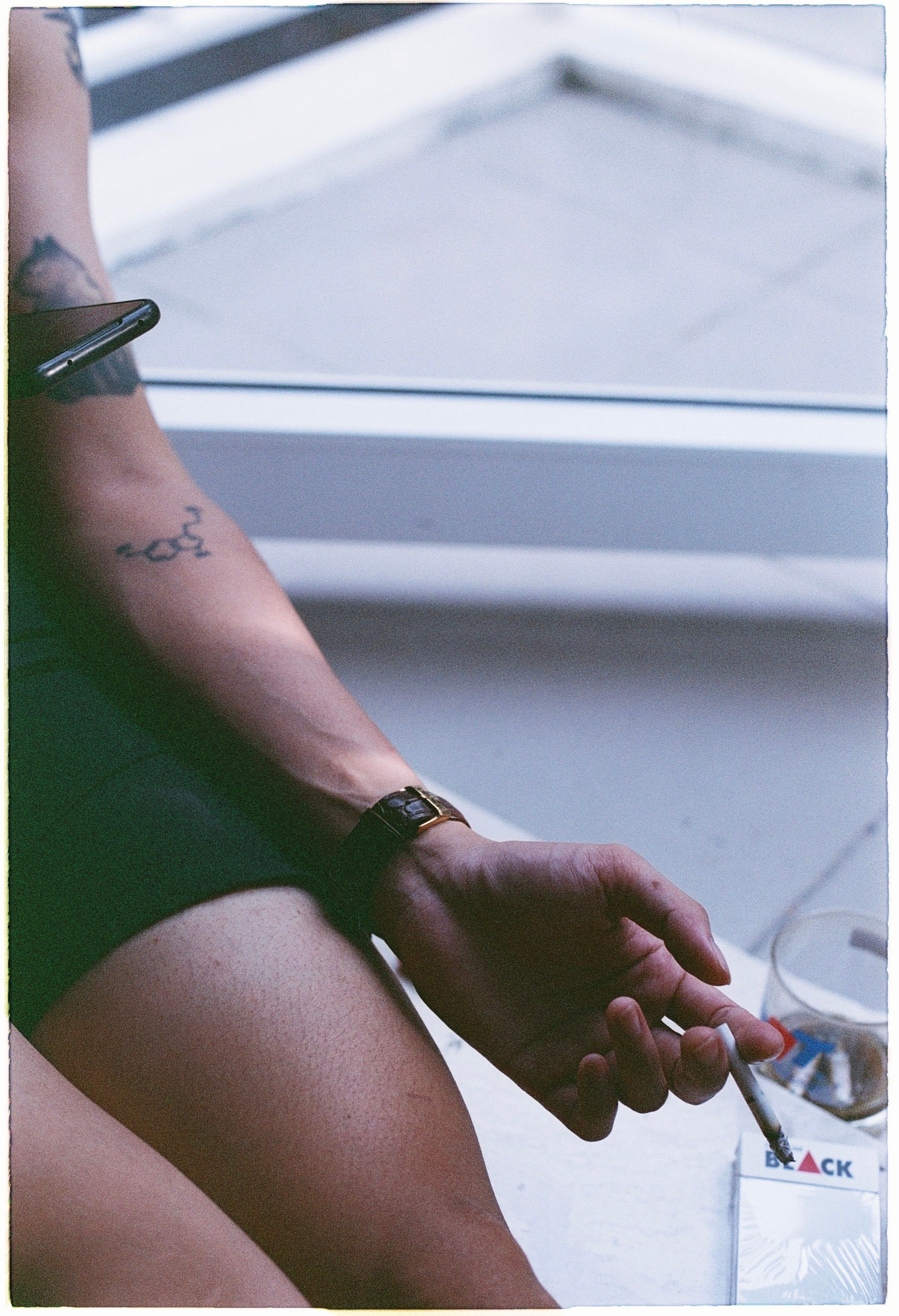 Girl with Tattoos Smoking Cigarette in Bath · Free Stock Photo