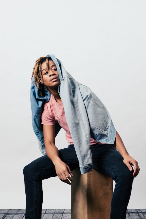 A Person Doing Posing with Denim Jacket 