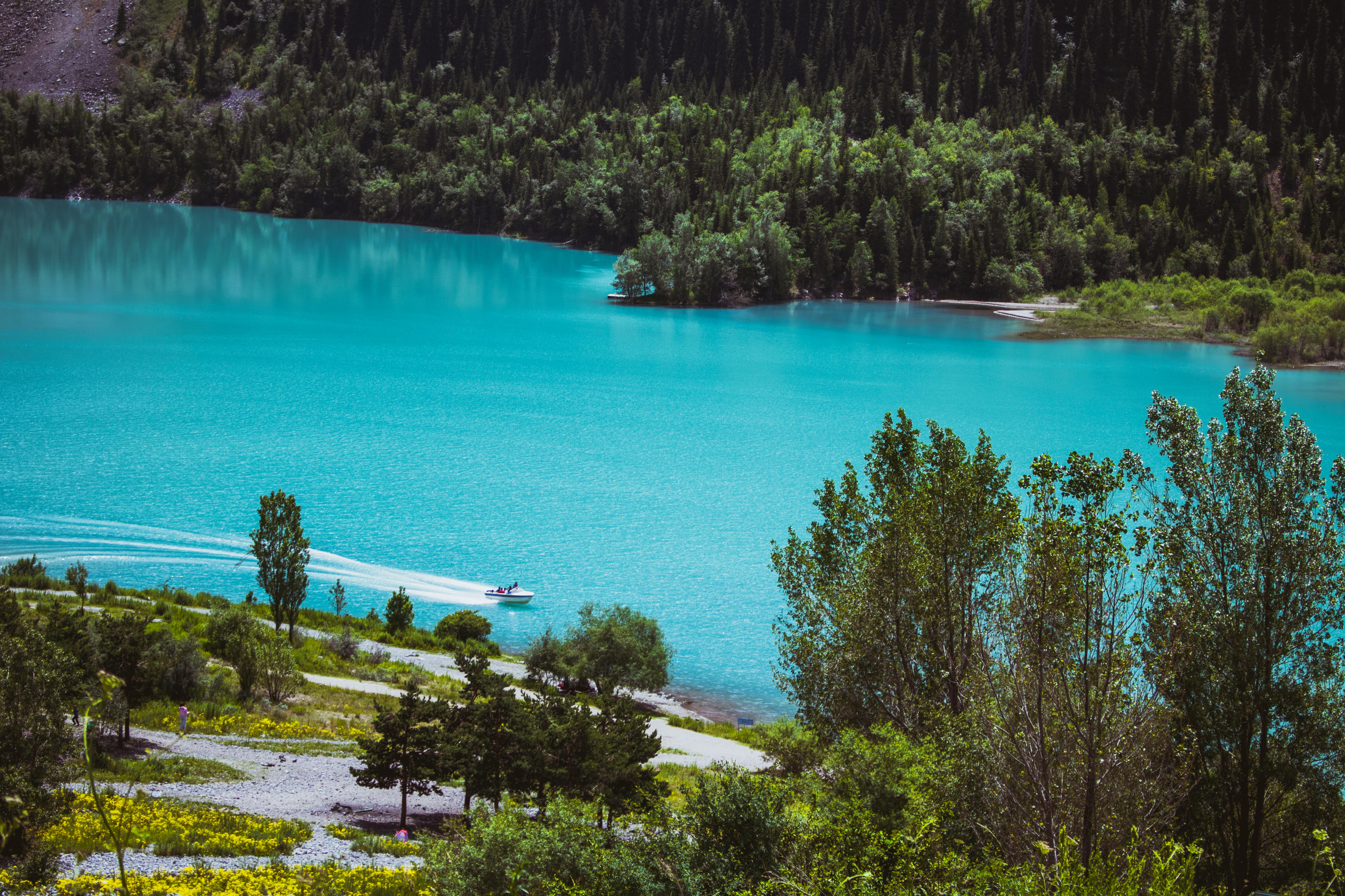 Birds Eye View of Blue Lake Center of Mountains · Free Stock Photo