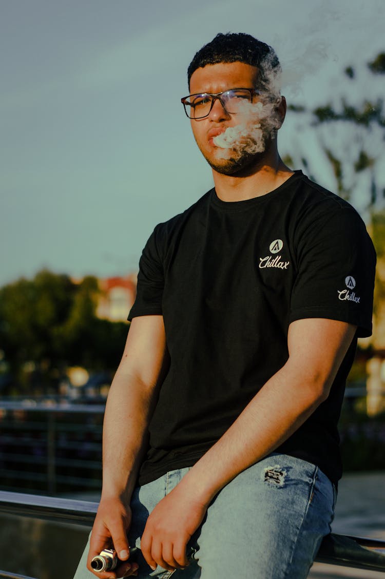 Man In Black Shirt Vaping
