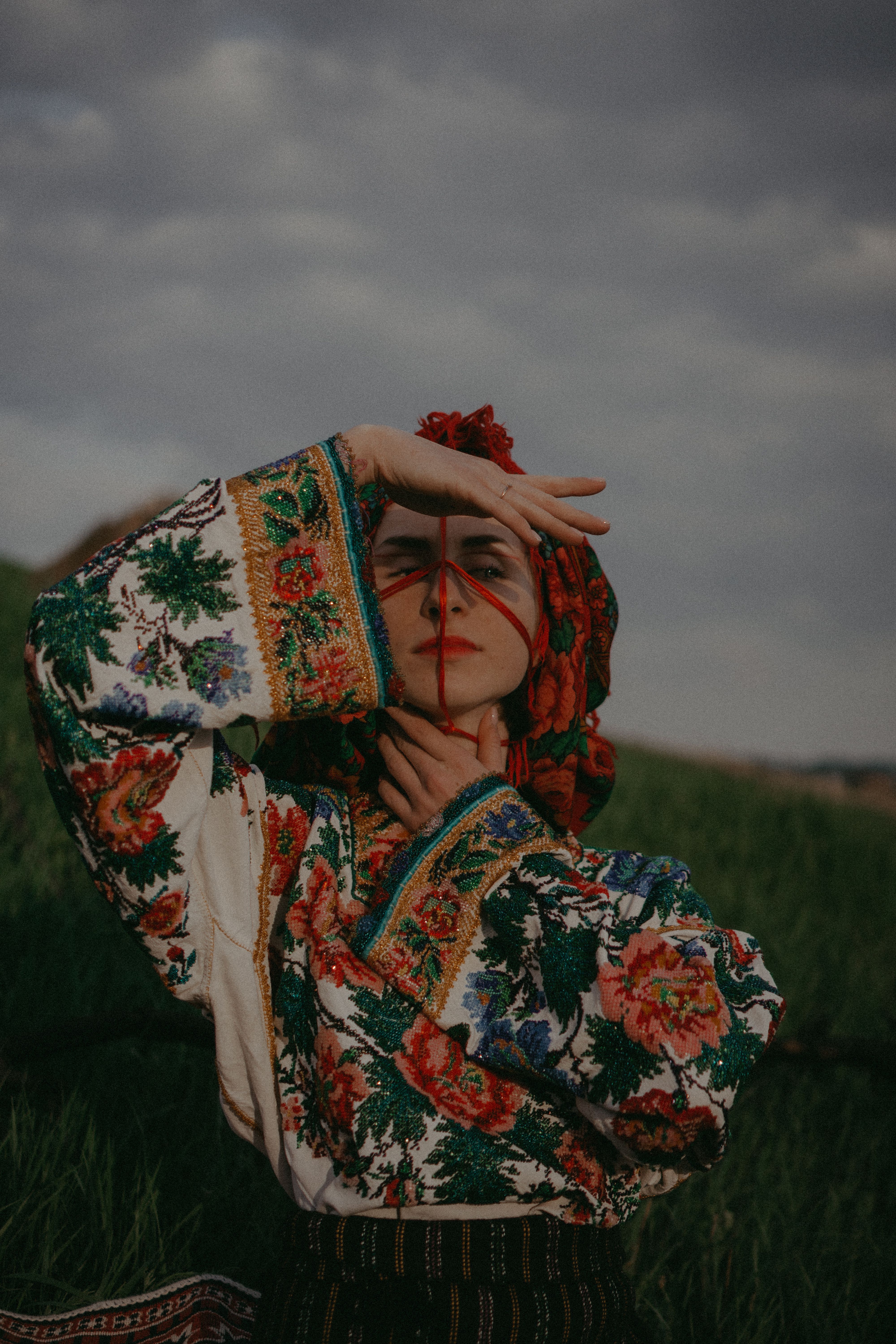 Woman Posing in Traditional Clothing · Free Stock Photo