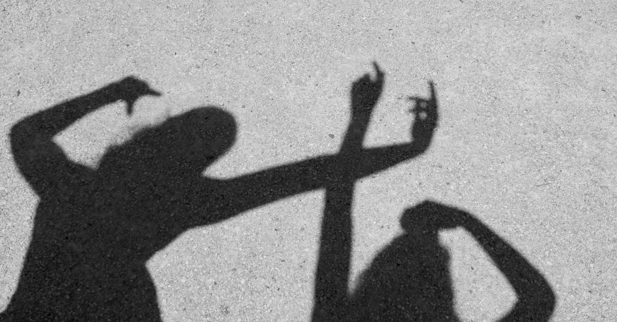 Shadow People Rasing One Hand Shadow of People Raising Their Hands · Free Stock Photo