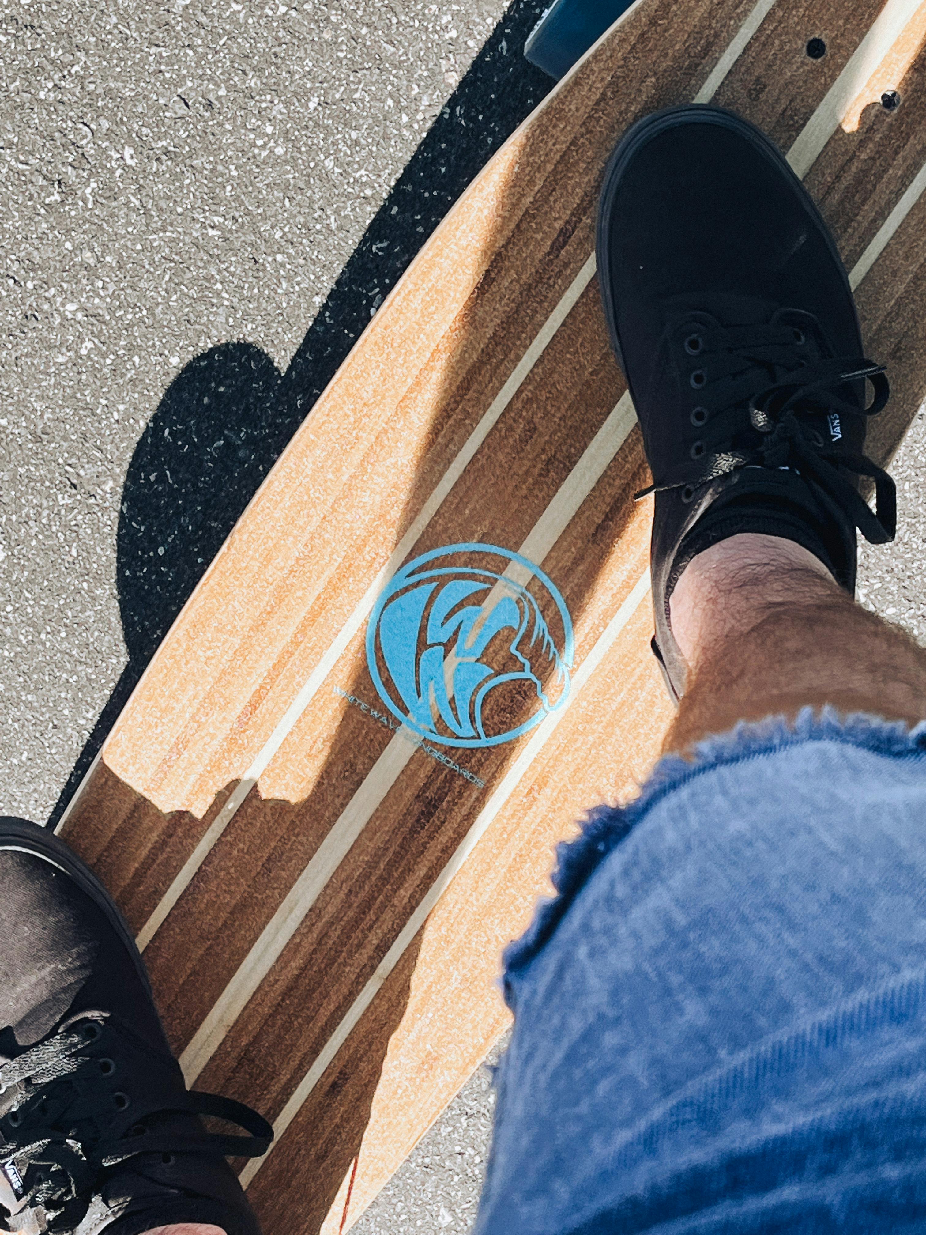 point of view of a person riding a long board