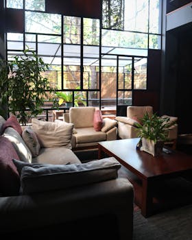 A beautifully designed living room with modern furniture and natural light.