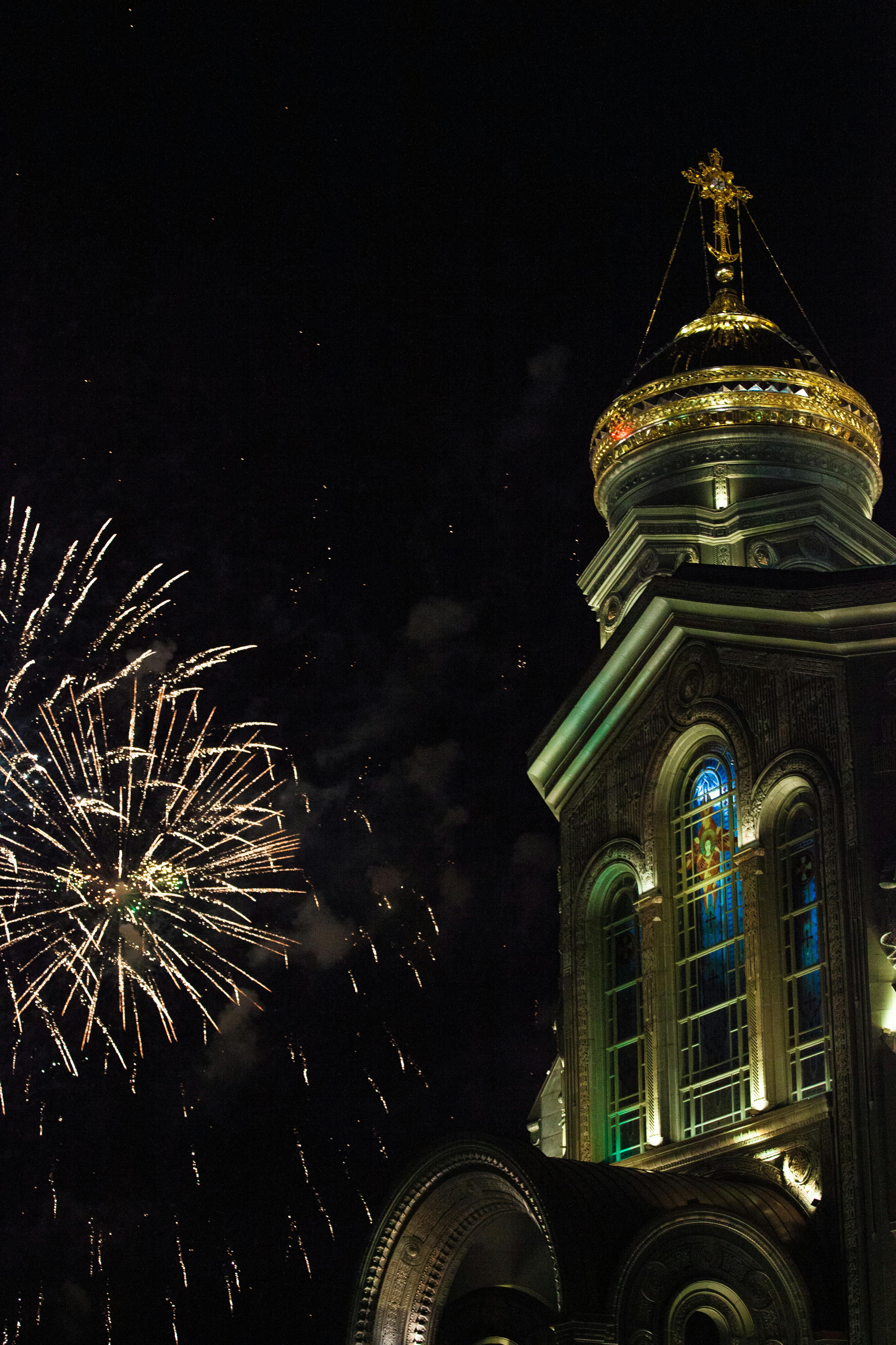 Fireworks by Illuminated Church · Free Stock Photo