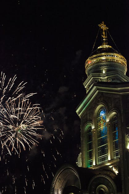 Fireworks by Illuminated Church · Free Stock Photo