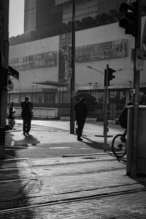 Grayscale Photo of People on the Street