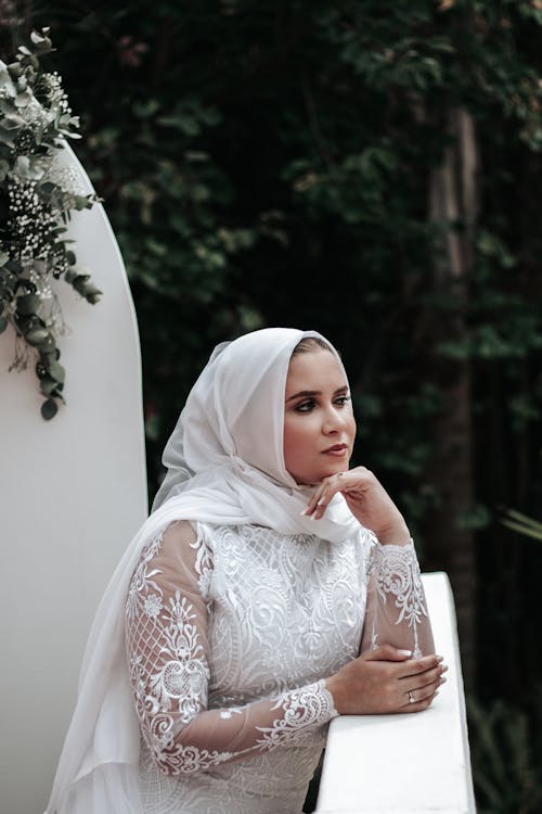 Beautiful Woman in White Dress with a Hijab