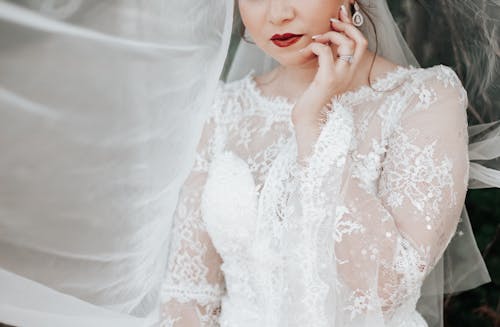 Woman in White Floral Wedding Dress