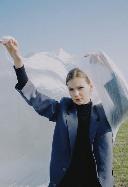 Beautiful Woman Holding Plastic