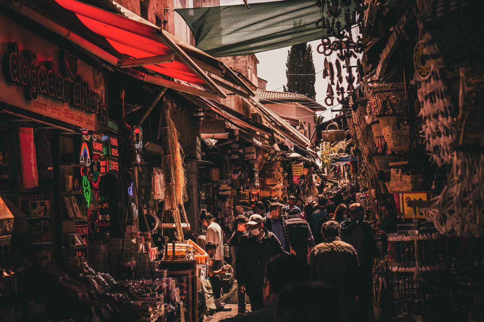 Captivating view of a vibrant street market in Istanbul, Turkey, filled with people shopping and exploring.