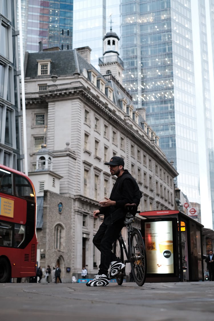 Man Leaning On His Bike