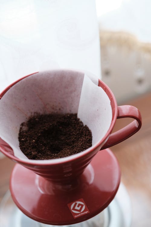 Free Ground Coffee in Drip Coffee Maker Stock Photo