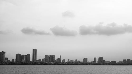 Grayscale Photo of City Skyline