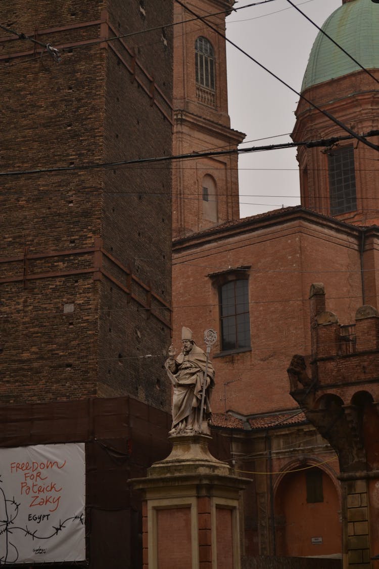 Statue Of San Petronio Outside The Basilica