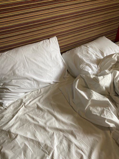 Free White Bedsheet and Pillow Case Stock Photo