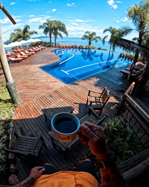 Free \A Person Having Coffee in a Beach Resort Stock Photo