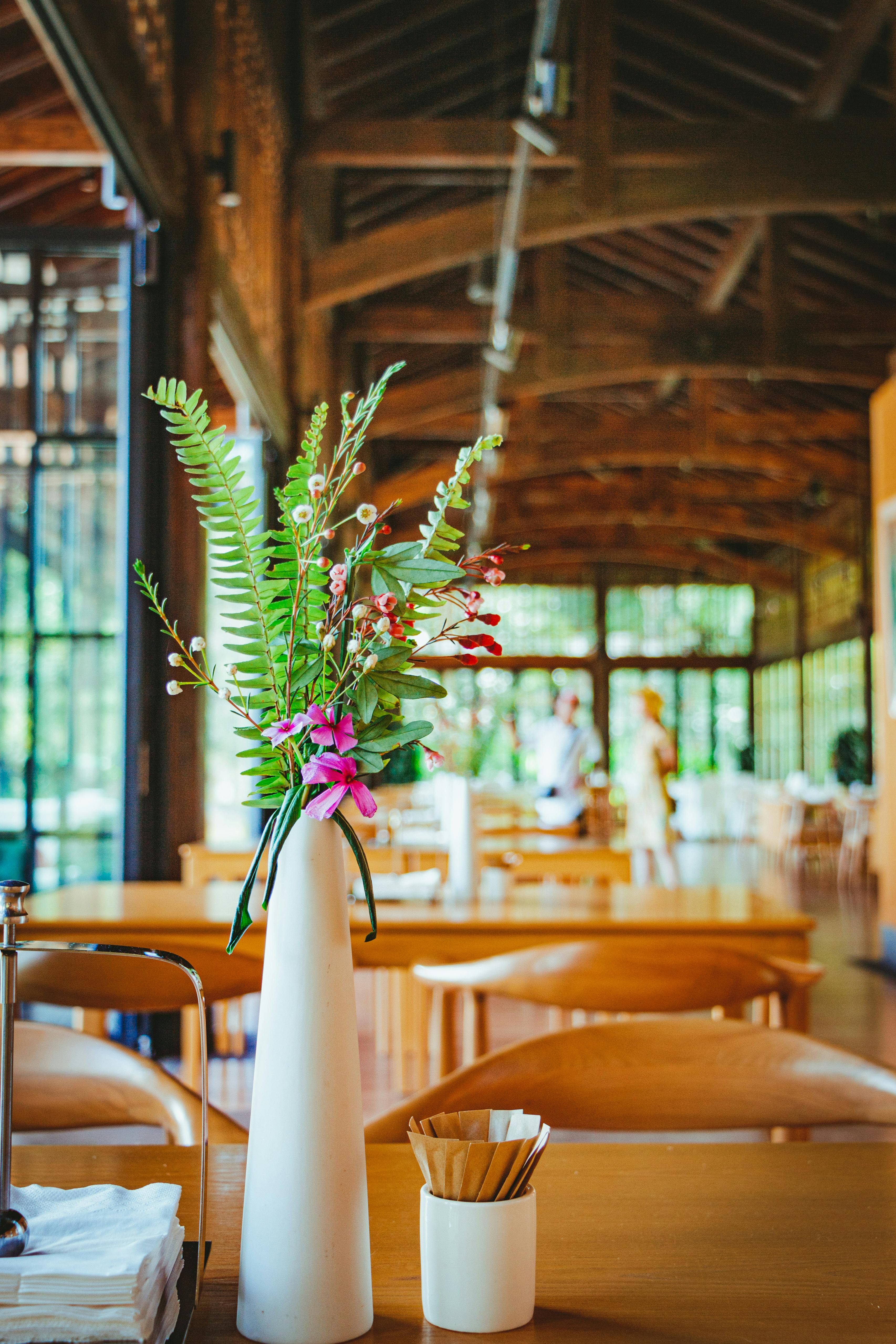 nice bouquet in vase on restaurant table