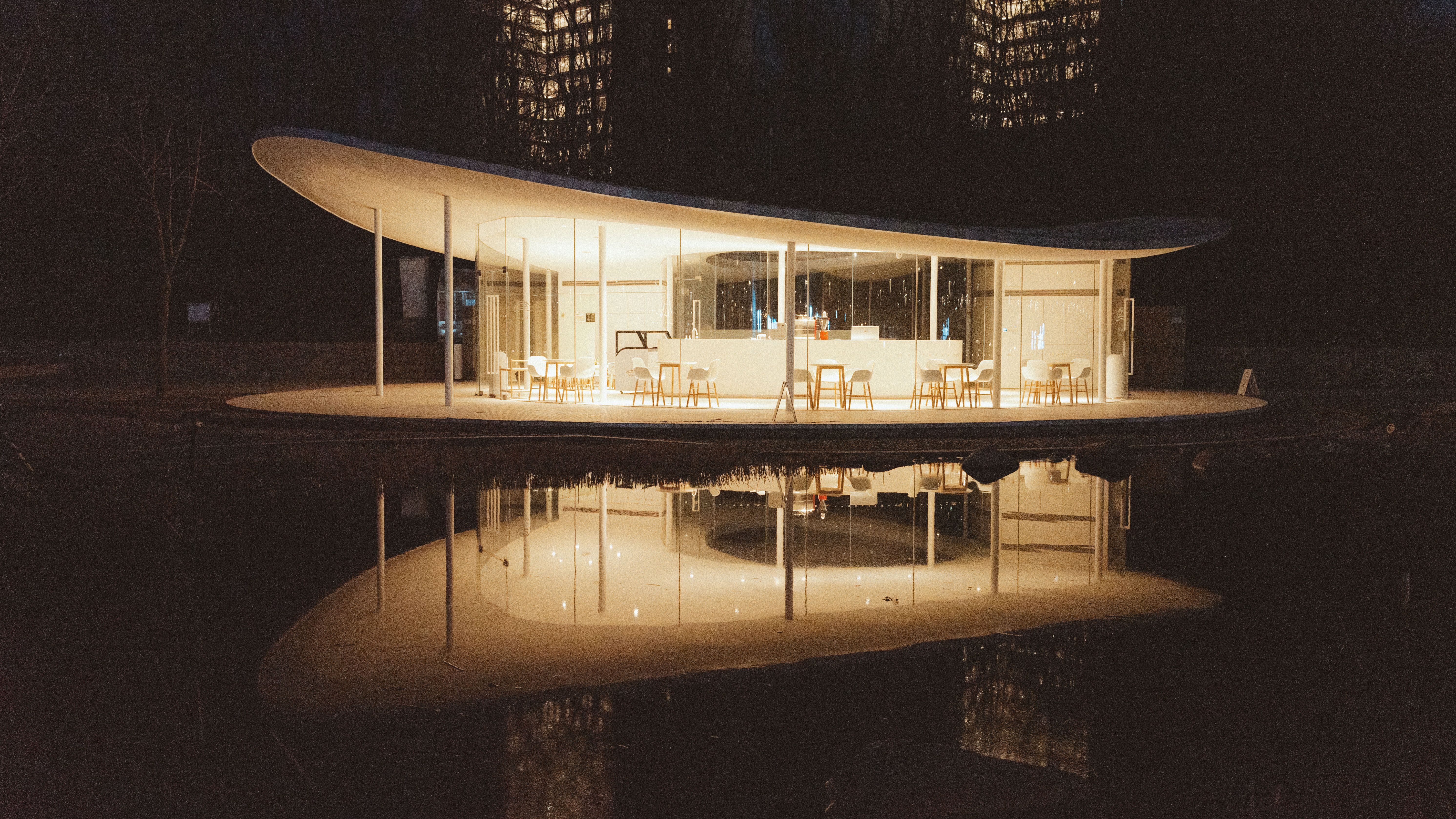 Luxury outdoor living space with pool and pavilion