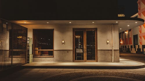 Brown Building with Glass Doors and Window