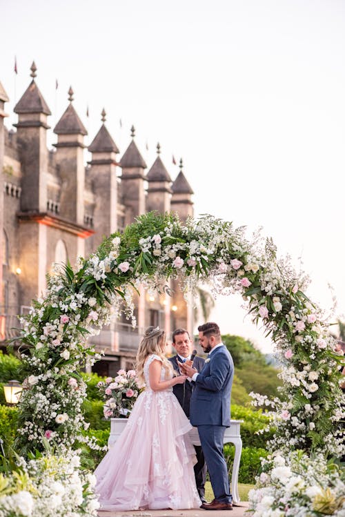 An Outdoor Wedding Near a Castle