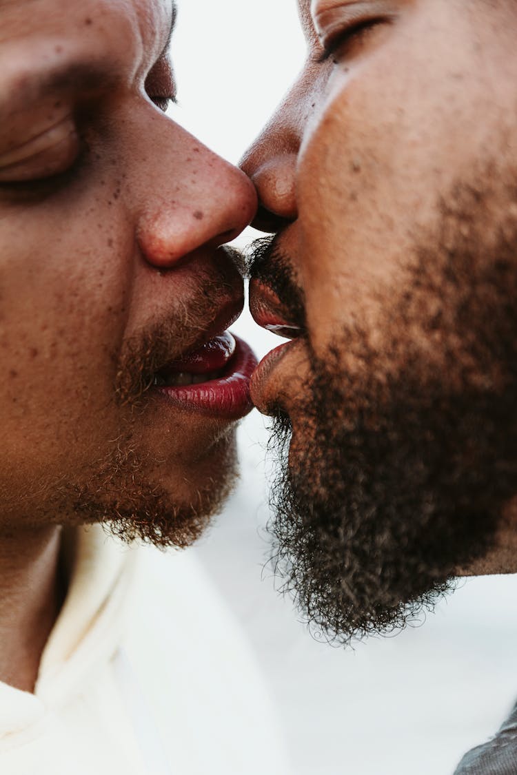 Gay Couple Kissing On Lips