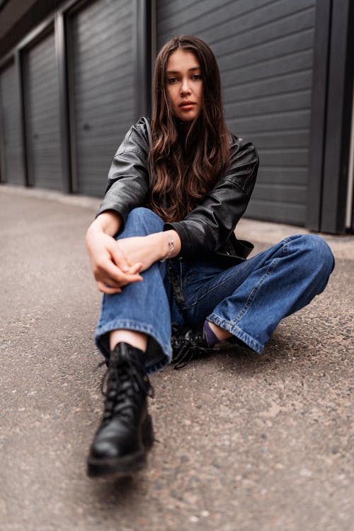 Beautiful Woman in Leather Jacket and Denim Pants