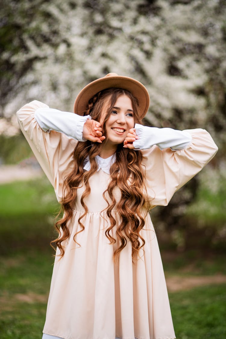 Portrait Of Happy Smiling Girl In Garden