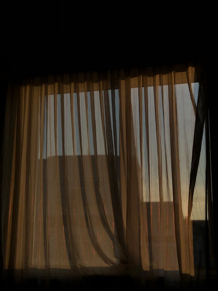 See Through Curtains On A Window