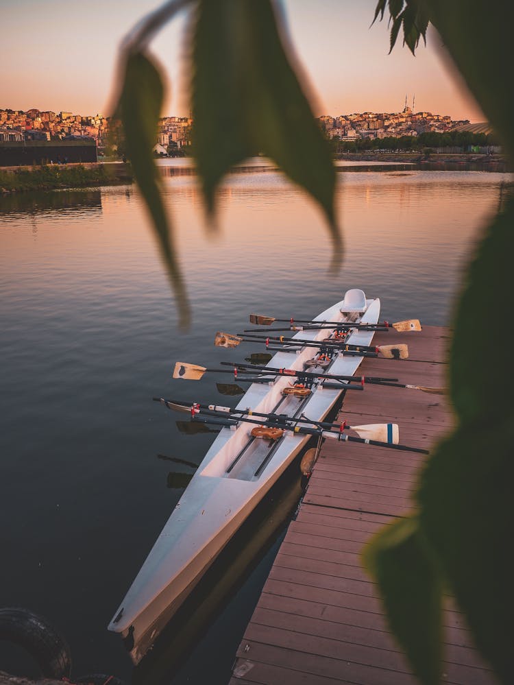 Racing Shell On Dock At Sunset