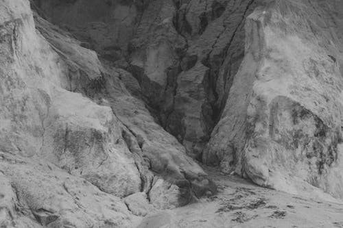 Grayscale Photo of Rock Formations
