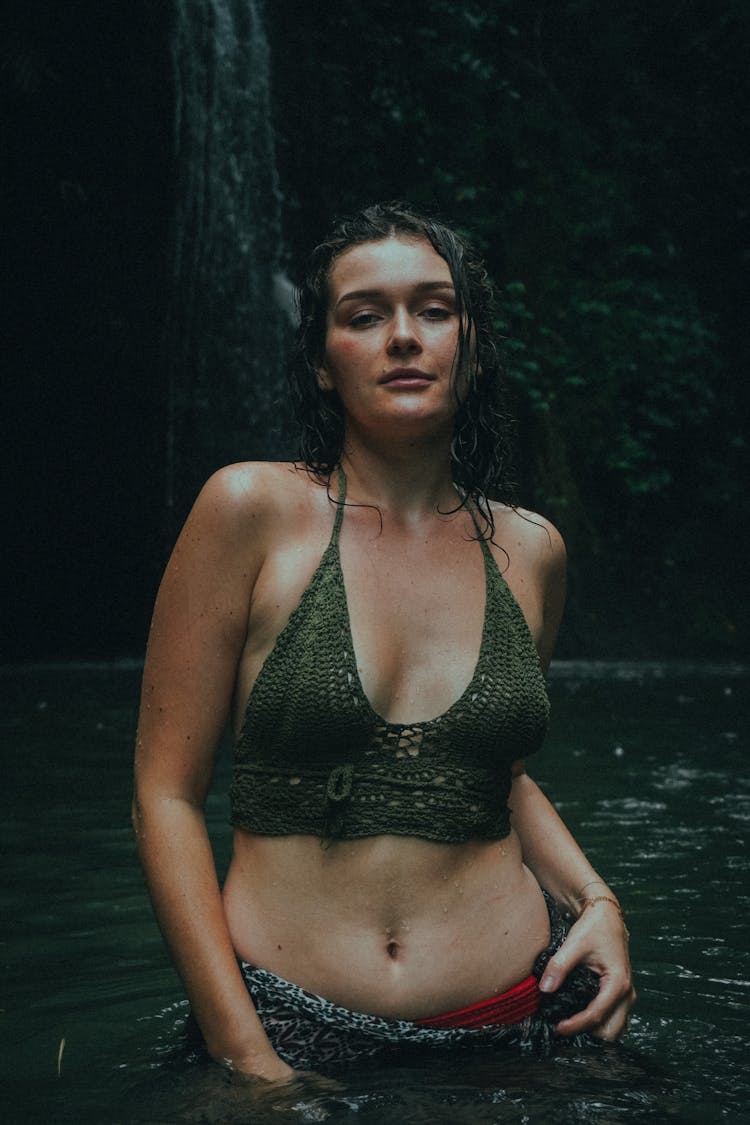 Woman Standing In Water With Wet Hair