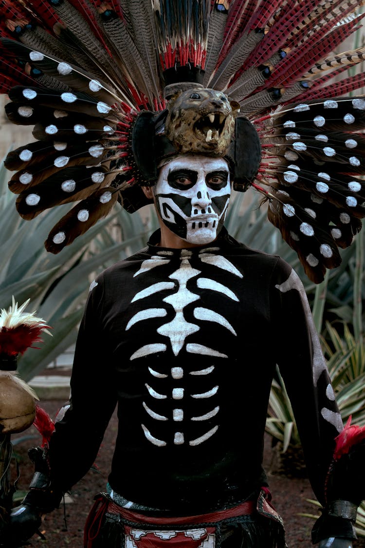 Man Wearing A Feather Headdress