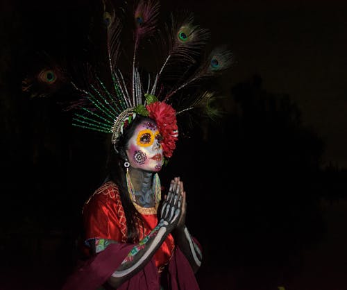 Woman Wearing Catrina Costume with Face Paint