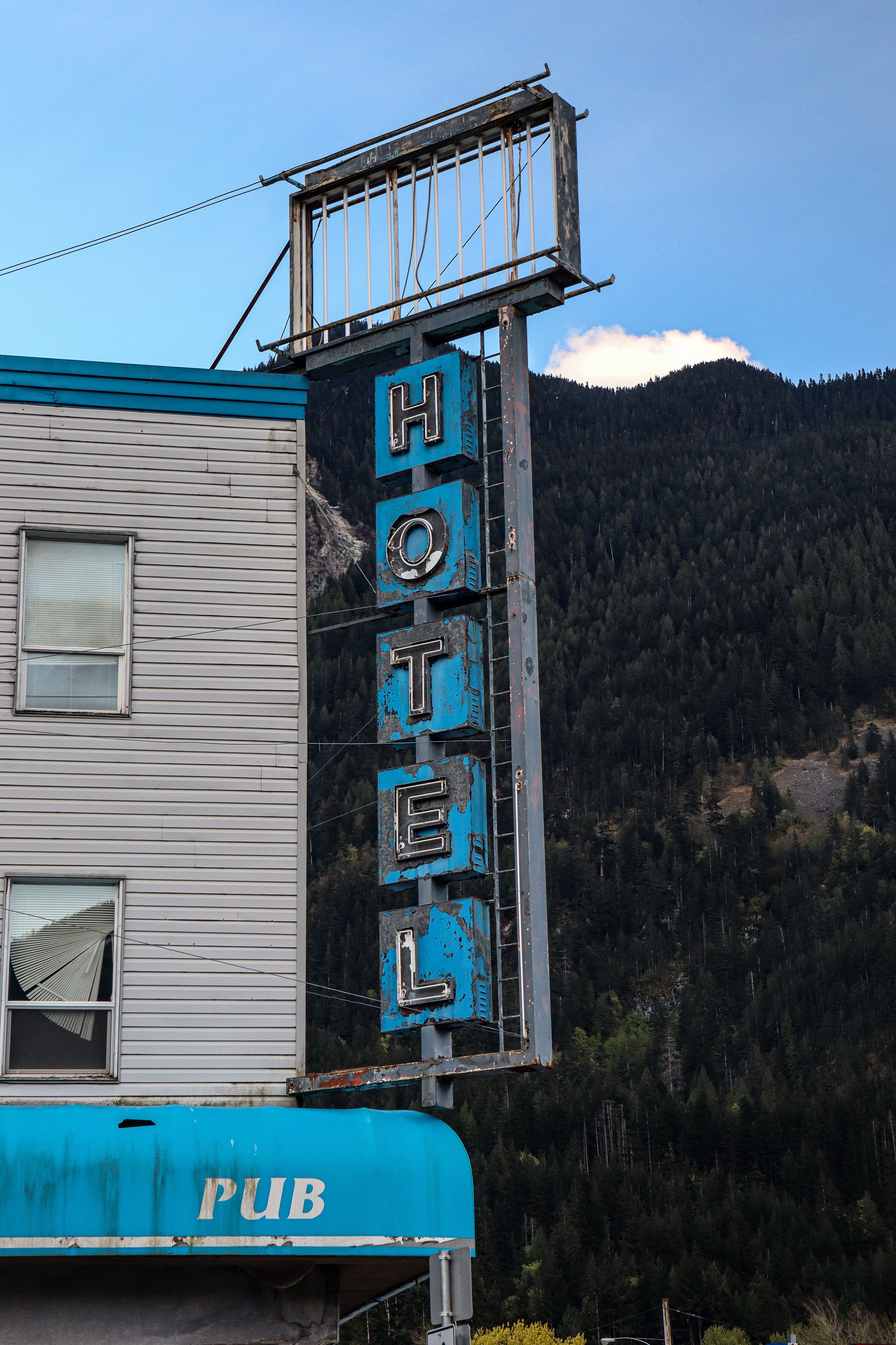 Blue Signage of a Hotel · Free Stock Photo