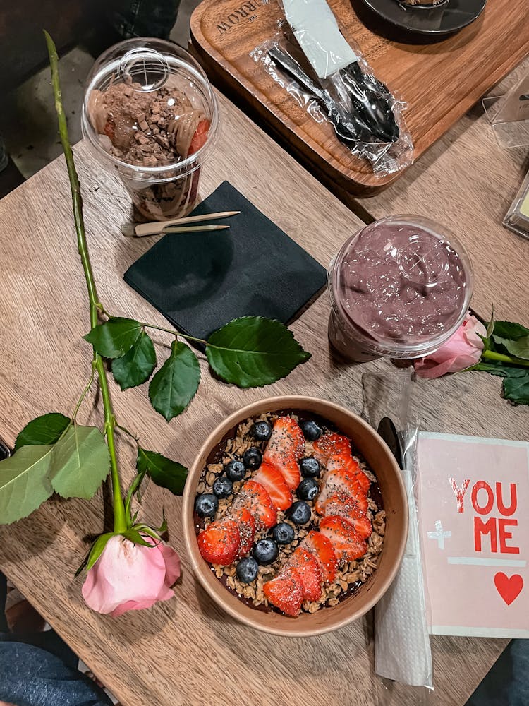 Food With Fruit In Bowl And Flower Near