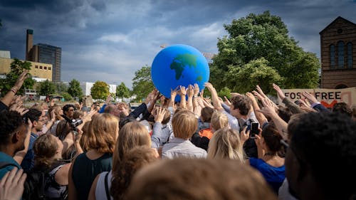 Free Group of People Doing a Demonstration on Global Climate and Environmental Issues Stock Photo