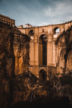 Breathtaking view of Puente Nuevo bridge spanning a deep gorge in Ronda, Spain.