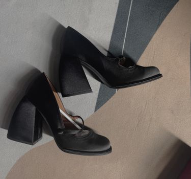 Pair of black Mary Jane high block heels with a chic design.